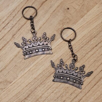 llavero corona rey cobre