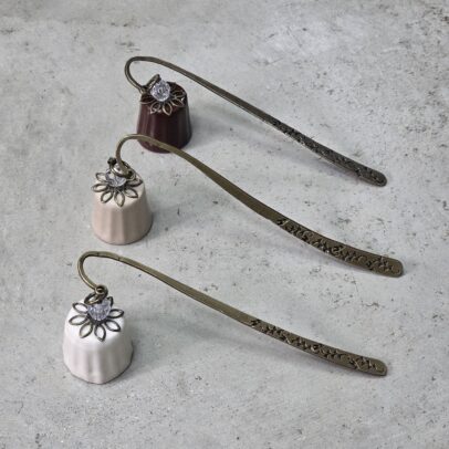 APAGAVELAS CERAMICA SURTIDOS/ VARILLA METAL BRONCE