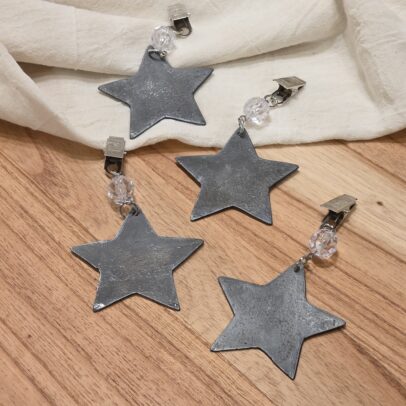 PESAS DE METAL ESTRELLA PLATA X 4 UNIDADES