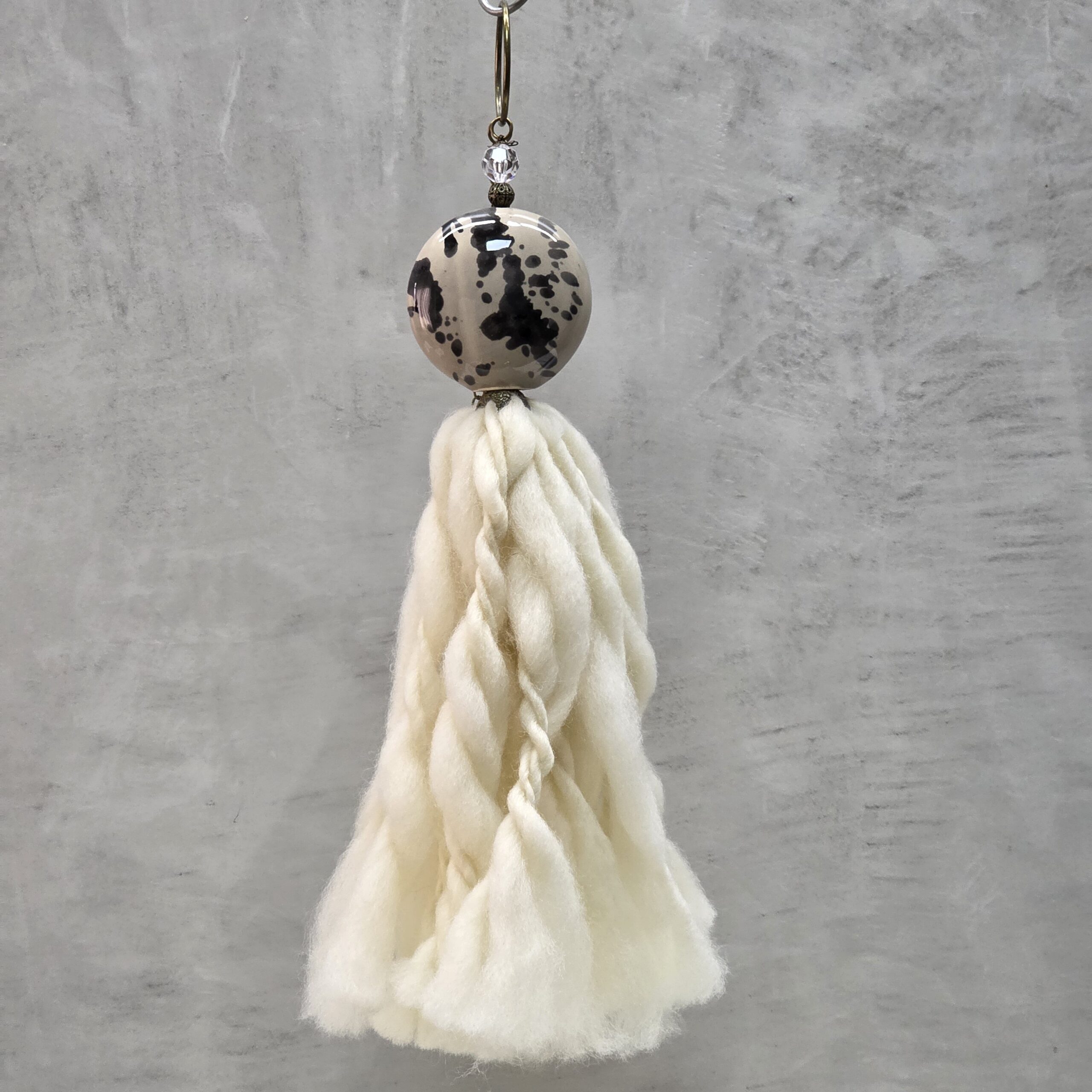 BORLA MEDALLON CERAMICA GRIS SPLASH NEGRO / LANA FLAMA
