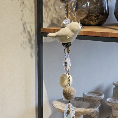 Tira pompom pajarito vison