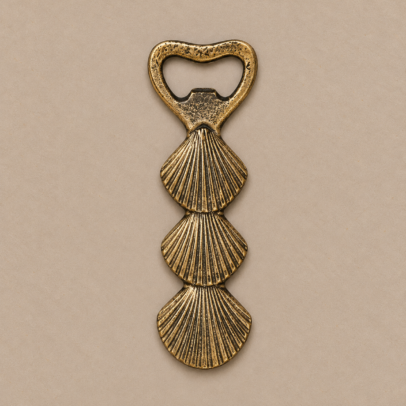 DESTAPADOR DE METAL SEASHELLS BRONCE